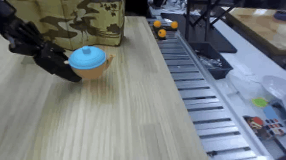 Animated result for the occluded distant water pouring task.